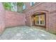 Brick-walled patio with stone flooring offers a unique outdoor space at 452 Brushstroke Se Ct, Marietta, GA 30067