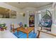 Inviting screened porch with hanging swing and views of dining area at 452 Brushstroke Se Ct, Marietta, GA 30067