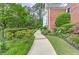 Brick trimmed walkway guides you toward the home at 452 Brushstroke Se Ct, Marietta, GA 30067