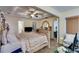 Bedroom featuring tray ceilings, and ample space, creating a luxurious and relaxing ambiance at 5069 Luxford Dr, Douglasville, GA 30135