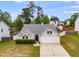An inviting single-Gathering home boasts manicured grounds and a convenient two-car garage at 5069 Luxford Dr, Douglasville, GA 30135