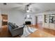 Inviting living room offering hardwood floors, fireplace, and neutral-colored decor at 5069 Luxford Dr, Douglasville, GA 30135