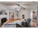 Spacious living room showcases hardwood floors, a fireplace, and built-in shelving at 5069 Luxford Dr, Douglasville, GA 30135
