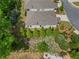 A beautiful aerial view of a home with a well-maintained roof and landscaping at 52 Lantern Trce, Hiram, GA 30141