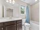 Clean bathroom with tile floors and shower/tub combo at 52 Lantern Trce, Hiram, GA 30141