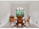 Dining room with natural lighting and wood furniture for an intimate dining experience at 52 Lantern Trce, Hiram, GA 30141