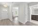 Bright entryway featuring wood floors and views into the bedroom and bathroom at 52 Lantern Trce, Hiram, GA 30141