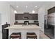 Modern kitchen featuring granite countertops and stainless steel appliances at 52 Lantern Trce, Hiram, GA 30141