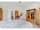 Spacious main bedroom includes built in shelving for ample storage and access to the ensuite bathroom at 52 Lantern Trce, Hiram, GA 30141