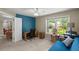 Inviting bedroom includes desk area, futon sofa, and a large window offering scenic views at 5626 River Heights Se Xing, Marietta, GA 30067