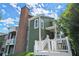 Exterior view of a condo featuring brick chimney, and a deck perfect for outdoor living at 5626 River Heights Se Xing, Marietta, GA 30067