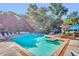 Inviting community pool with ample seating and shaded areas, perfect for relaxation and leisure at 5626 River Heights Se Xing, Marietta, GA 30067