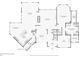Detailed first floor plan showcasing layout, including kitchen, living room, bedrooms, and garage space at 6515 Ashbourne Ct, Suwanee, GA 30024