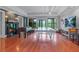 Expansive recreation room features hardwood floors, fireplace, and entertainment area at 6515 Ashbourne Ct, Suwanee, GA 30024