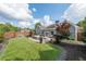 Backyard featuring a lush lawn, a patio with seating, and manicured landscaping at 17 Lexington Ct, Dallas, GA 30157