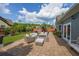 Relaxing backyard patio with a fire pit, comfortable outdoor furniture, and landscaped green space at 17 Lexington Ct, Dallas, GA 30157