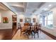 Bright dining room with coffered ceiling, hardwood floors, and a large window, perfect for entertaining at 17 Lexington Ct, Dallas, GA 30157
