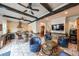 Entertainer's game room featuring a bar area, brick flooring and custom cabinetry at 17 Lexington Ct, Dallas, GA 30157