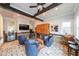 Entertainer's game room featuring a bar area, brick flooring and custom cabinetry at 17 Lexington Ct, Dallas, GA 30157