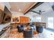 Entertainer's game room featuring a bar area, brick flooring and custom cabinetry at 17 Lexington Ct, Dallas, GA 30157