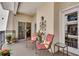 Relaxing balcony with chairs and small tables, perfect for enjoying the fresh air and the outdoor views at 175 15Th Ne St # 304, Atlanta, GA 30309