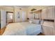Comfortable bedroom with built-in cabinets, drawers, and large opening to an en suite bathroom at 175 15Th Ne St # 304, Atlanta, GA 30309