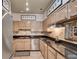 Efficient kitchen featuring stainless steel appliances, granite countertops, and backsplash at 175 15Th Ne St # 304, Atlanta, GA 30309