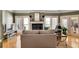 Spacious living room with a fireplace, television, and comfortable seating arrangement at 175 15Th Ne St # 304, Atlanta, GA 30309