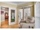 Relaxing sunroom with comfortable chair, and sliding glass doors leading outside at 175 15Th Ne St # 304, Atlanta, GA 30309