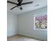 Bedroom with new hardwood floors, window, and ceiling fan at 2859 Spring Villa Se Ln, Smyrna, GA 30080