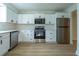 Renovated kitchen with stainless steel appliances, quartz countertops and modern finishes at 2859 Spring Villa Se Ln, Smyrna, GA 30080