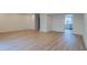 Open-concept living room with hardwood floors and access to the updated kitchen area at 2859 Spring Villa Se Ln, Smyrna, GA 30080