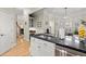 Bright kitchen with island, breakfast bar and stainless steel appliances at 8730 Parker Pl, Roswell, GA 30076