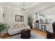 Cozy living room with stylish furniture, hardwood floors, and natural light, creating a relaxing atmosphere at 8730 Parker Pl, Roswell, GA 30076