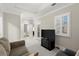 A sitting room boasts a view into a bathroom at 8730 Parker Pl, Roswell, GA 30076