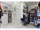 A spacious walk-in closet with custom shelving and ample storage space at 8730 Parker Pl, Roswell, GA 30076