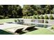Backyard pool, lounge chairs, and serene landscaping create a perfect relaxation spot at 0 Highway 279, Fayetteville, GA 30214