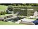 Inviting pool area with patio, garden, lounge chairs, and lush landscaping at 0 Highway 279, Fayetteville, GA 30214