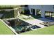 Beautiful backyard swimming pool with lounge chairs and well-maintained landscaping at 0 Highway 279, Fayetteville, GA 30214