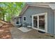Outdoor living space with patio and seating at 115 Lake Pines Ct, Roswell, GA 30076