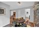 Dining area with table, chairs, and access to other living spaces at 115 Lake Pines Ct, Roswell, GA 30076
