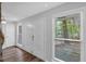 Bright and inviting foyer with beautiful flooring, a double door entry, and views to the front at 115 Lake Pines Ct, Roswell, GA 30076