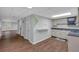 Kitchen with white cabinetry and black counters at 115 Lake Pines Ct, Roswell, GA 30076