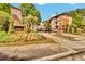 A beautifully landscaped entrance to a gated community, creating a sense of privacy at 200 Ne Renaissance Ne Pkwy # 304, Atlanta, GA 30308