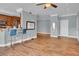 Modern living area with hardwood floors and stylish bar seating at 200 Ne Renaissance Ne Pkwy # 304, Atlanta, GA 30308
