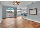 Bright living room featuring stylish wood floors and a large window with decorative glass at 200 Renaissance Ne Pkwy # 304, Atlanta, GA 30308