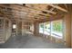 Framed interior displaying a large window overlooking the new home's backyard at 214 Wild Ginger Bnd, Woodstock, GA 30188