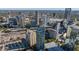 High-rise building in a dense urban environment, showcasing the city skyline with other buildings and greenery at 3338 Peachtree Ne Rd # 3406, Atlanta, GA 30326
