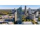 Aerial view of high rise building surrounded by trees and other buildings at 3338 Peachtree Ne Rd # 3406, Atlanta, GA 30326