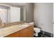 Bathroom featuring single sink with granite countertop and unique floor tiling at 3338 Peachtree Ne Rd # 3406, Atlanta, GA 30326